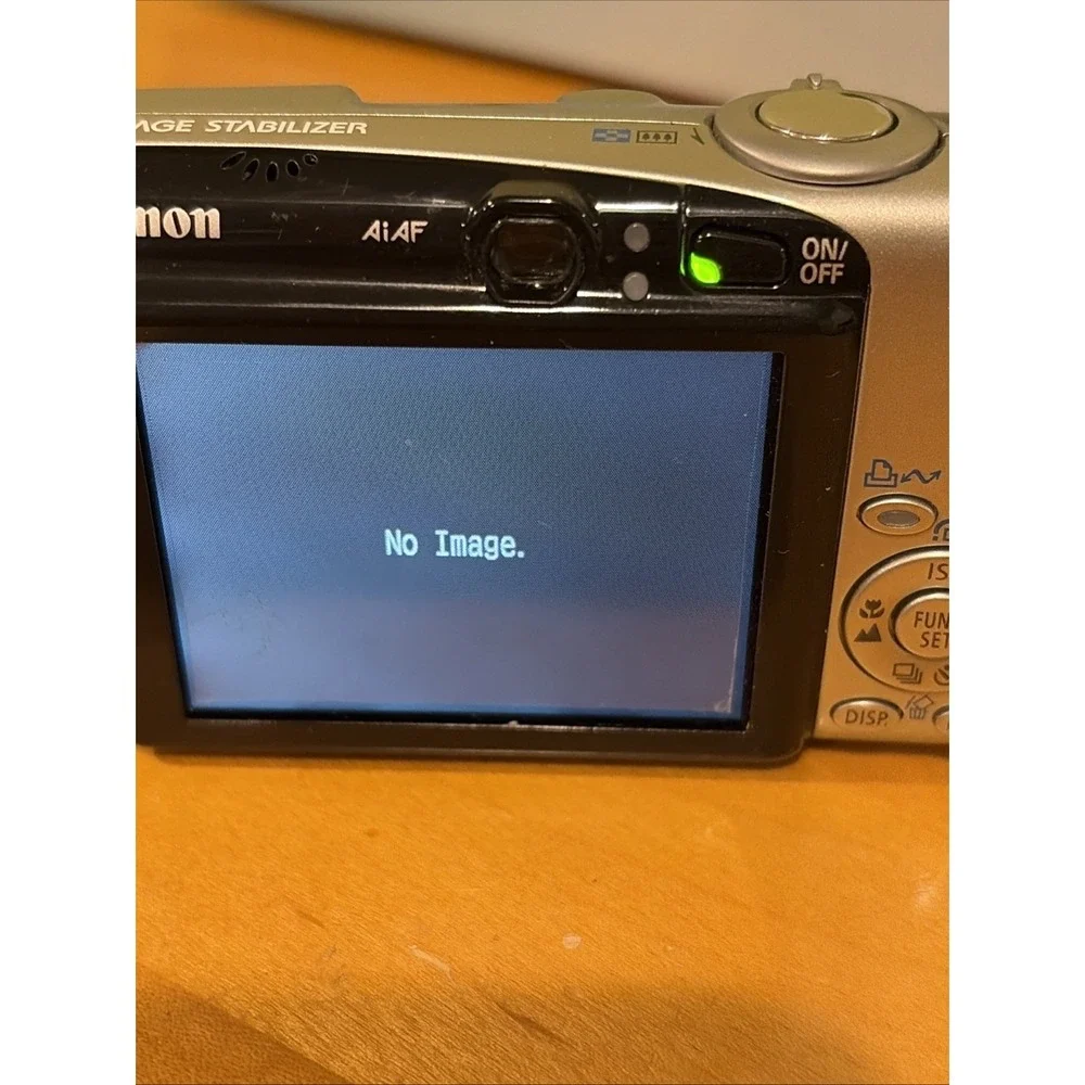 Canon PowerShot SD700 IS 6.0MP Digital Camera New Battery & Charger & SD Card